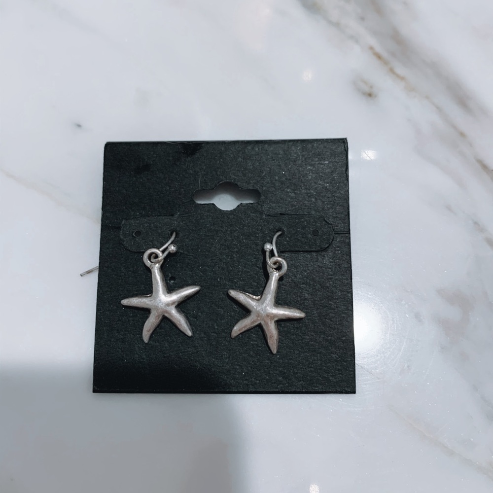 Silver starfish earrings.